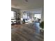 Modern living area featuring an open floor plan and combination dining and living space at 1750 Gold Ave, Sarasota, FL 34235