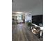 Bright and airy living space with stainless steel appliances and a flat screen television at 1750 Gold Ave, Sarasota, FL 34235