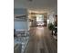 Open-concept living area showcasing the kitchen and bar seating at 1750 Gold Ave, Sarasota, FL 34235