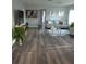 Bright and airy living room with stylish decor and wood-look flooring at 1750 Gold Ave, Sarasota, FL 34235