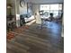 Inviting living room featuring stylish decor, a modern dining set, and ample natural light at 1750 Gold Ave, Sarasota, FL 34235