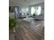 Bright living room with a comfortable sofa, stylish decor, and lots of natural light at 1750 Gold Ave, Sarasota, FL 34235