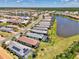Beautiful aerial view of a residential community with lakes and well-maintained homes, some featuring private pools at 17714 Northwood Pl, Bradenton, FL 34202