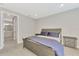 Comfortable bedroom featuring neutral decor, an inviting bed, and a tranquil ambiance at 17714 Northwood Pl, Bradenton, FL 34202