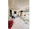 Bright and airy sunroom featuring tile flooring and comfortable seating arrangements at 1829 Cypress Point Ln, Sarasota, FL 34234