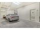 Spacious garage featuring clean white walls, ample parking and dedicated storage at 1932 Harbourside Dr # 217, Longboat Key, FL 34228