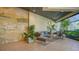 Elegant lobby area with comfortable seating, stylish decor, and ample natural light at 1932 Harbourside Dr # 217, Longboat Key, FL 34228