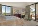 Light and airy main bedroom with balcony access, sitting area and ensuite at 1932 Harbourside Dr # 217, Longboat Key, FL 34228