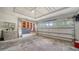Clean and spacious garage with built-in shelving and storage solutions, perfect for organization and convenience at 2385 Tall Oak Ct, Sarasota, FL 34232