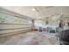 Spacious garage with ample storage space and a large garage door leading to the outdoors at 2385 Tall Oak Ct, Sarasota, FL 34232