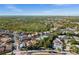 Aerial view of a cozy home nestled in a neighborhood surrounded by lush greenery at 3390 Yonge Ave # 41, Sarasota, FL 34235