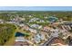 Expansive aerial shot of a residential area with lakes, mature trees, and diverse housing styles at 3390 Yonge Ave # 41, Sarasota, FL 34235