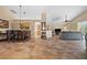 Bright and airy living area featuring tile floors, open floor plan, and a high ceiling at 3390 Yonge Ave # 41, Sarasota, FL 34235