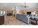 Open-concept living room features neutral tones, tile flooring, and an inviting atmosphere perfect for relaxation and entertaining at 3390 Yonge Ave # 41, Sarasota, FL 34235