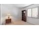 Bright bedroom with window, bookcase, and lamp, creating a cozy and inviting atmosphere for relaxation at 3763 Lake Bayshore Dr # 310, Bradenton, FL 34205