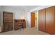 Bedroom with desk and closet, providing a comfortable and functional space for work or relaxation at 3763 Lake Bayshore Dr # 310, Bradenton, FL 34205