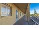 The exterior hallway provides access to residential units with a view of the parking area at 3763 Lake Bayshore Dr # 310, Bradenton, FL 34205
