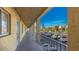 An exterior hallway offers a view of the complex, parking, and nearby trees at 3763 Lake Bayshore Dr # 310, Bradenton, FL 34205