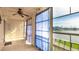 The cozy lanai offers a view of the water and surrounding greenery at 3763 Lake Bayshore Dr # 310, Bradenton, FL 34205