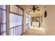 An enclosed lanai features a ceiling fan, laundry area, and sliding windows at 3763 Lake Bayshore Dr # 310, Bradenton, FL 34205