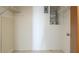 Functional walk-in closet featuring built-in shelves and an electrical panel, ideal for organized storage solutions at 3763 Lake Bayshore Dr # 310, Bradenton, FL 34205