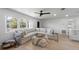 Spacious living room features comfortable seating, modern decor, and ample natural light at 414 79Th St, Holmes Beach, FL 34217