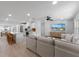 Open-concept living room and kitchen create a seamless entertaining space at 414 79Th St, Holmes Beach, FL 34217