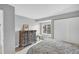 Bedroom with hardwood floors, a wooden dresser, and sliding door closet at 448 58Th St, Sarasota, FL 34243