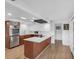 Modern kitchen with stainless steel appliances, sleek countertops, and stylish cabinetry at 448 58Th St, Sarasota, FL 34243