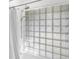 Shower featuring glass blocks and a shower head at 448 58Th St, Sarasota, FL 34243
