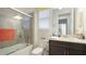 Bathroom featuring a shower-tub combo, vanity, and updated fixtures at 5416 Hope Sound Cir, Sarasota, FL 34238