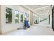 Bright exercise room with mirrors, natural light, and fitness equipment for diverse workouts at 5416 Hope Sound Cir, Sarasota, FL 34238