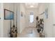 Welcoming foyer featuring neutral walls, decor, and bright lighting creating an inviting entrance at 5416 Hope Sound Cir, Sarasota, FL 34238