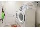 Laundry room with a front load washer and dryer at 5416 Hope Sound Cir, Sarasota, FL 34238