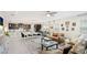 Open living space with a kitchen and Gathering room that flow together at 5416 Hope Sound Cir, Sarasota, FL 34238