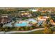 Aerial view highlighting the large community pool with ample seating and resort-style amenities at 5811 Brandon Run, Bradenton, FL 34211