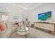 Bright and airy living space with modern decor, comfortable seating, and an open layout, perfect for entertaining guests at 5811 Brandon Run, Bradenton, FL 34211