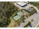 Aerial view showcasing tennis courts, bocce ball court, and a covered pavilion at 5917 Cessna Run, Lakewood Ranch, FL 34211