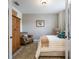 Comfortable bedroom with a wood wardrobe and neutral decor at 5917 Cessna Run, Lakewood Ranch, FL 34211
