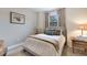 Bright bedroom featuring a queen bed and ample natural light at 5917 Cessna Run, Lakewood Ranch, FL 34211