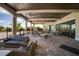 Inviting patio with brick flooring, comfortable seating, and great views at 5917 Cessna Run, Lakewood Ranch, FL 34211