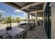 Beautiful covered patio with ceiling fans and outdoor seating area at 5917 Cessna Run, Lakewood Ranch, FL 34211