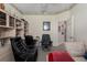 Home office boasting a built-in shelves, comfortable seating, and natural light at 6210 Laurel Creek Trl, Ellenton, FL 34222
