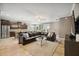 Expansive living room with seamless access to the kitchen, with tile flooring and modern finishes at 6381 Mighty Eagle Way, Sarasota, FL 34241