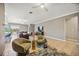 Spacious living area features tiled floors, contemporary furniture, and an open layout at 6381 Mighty Eagle Way, Sarasota, FL 34241
