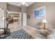 Comfortable living space features a view to the kitchen, decorative art, and open floor plan at 686 Silk Oak Dr, Venice, FL 34293