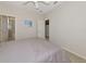 Bedroom providing easy access to both the bathroom and kitchen areas at 7035 Owls Nest Ter, Bradenton, FL 34203