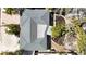 Aerial view of the residence showcasing the roof and perimeter landscaping at 711 Birdsong Ln, Sarasota, FL 34242