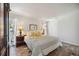 Bright bedroom with hardwood floors, natural light, and sunny decor at 711 Birdsong Ln, Sarasota, FL 34242