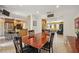 Dining area connects to kitchen and living room, creating an open floor plan for entertaining at 711 Birdsong Ln, Sarasota, FL 34242